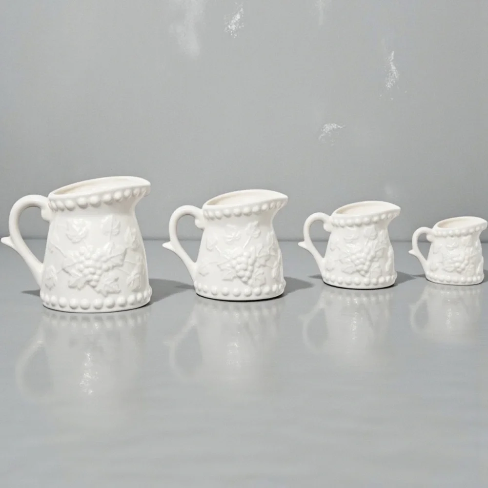 Vintage Napco White Ceramic measuring cups w/embossed grape & vine design, 4.